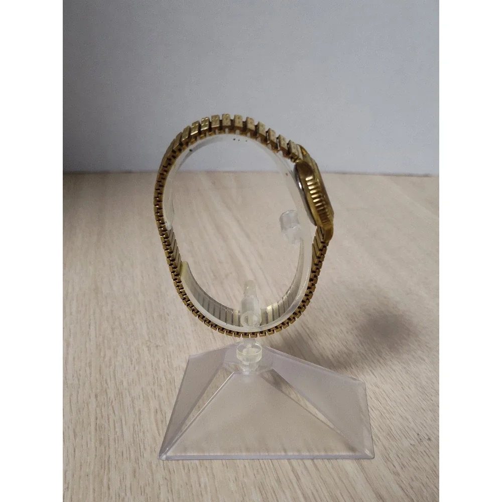 AVON Everyday Stretch Goldtone Watch Ladies Round Dial New Battery